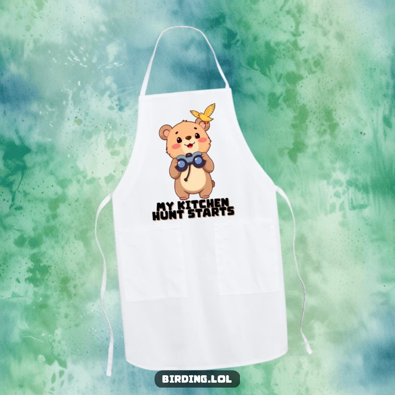 Funny bear cub wearing an apron and binoculars, looking up with excitement, suitable for kitchen use.