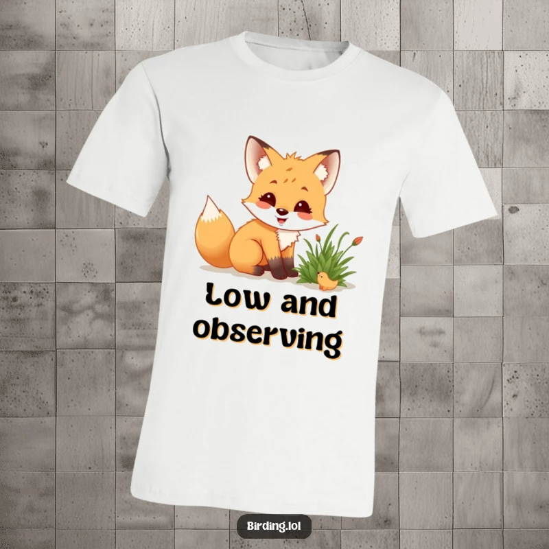 Funny fox cub crouching low, delighted, observing a small creature in a bush, perfect for nature lovers.